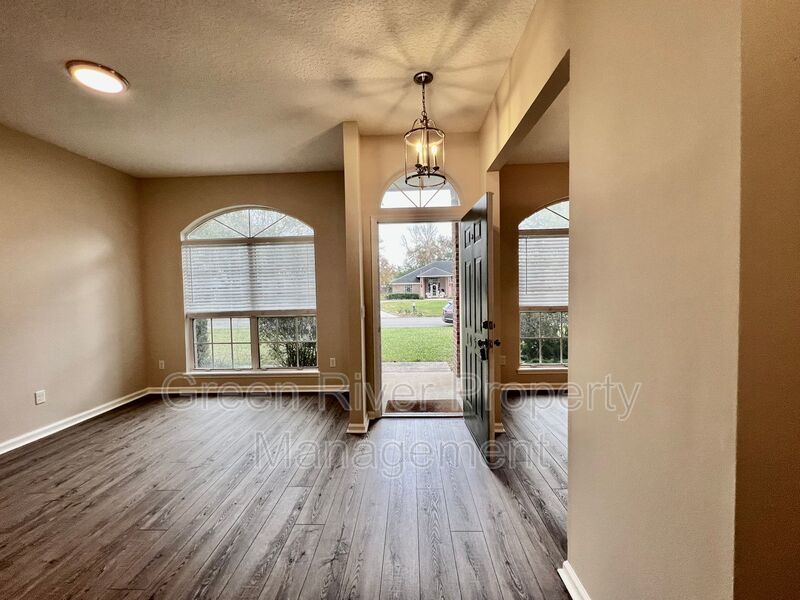 Behind the Gates: A Corner-Lot 4 bedroom, 2 bath Retreat in Coveted Pace Island!! property image