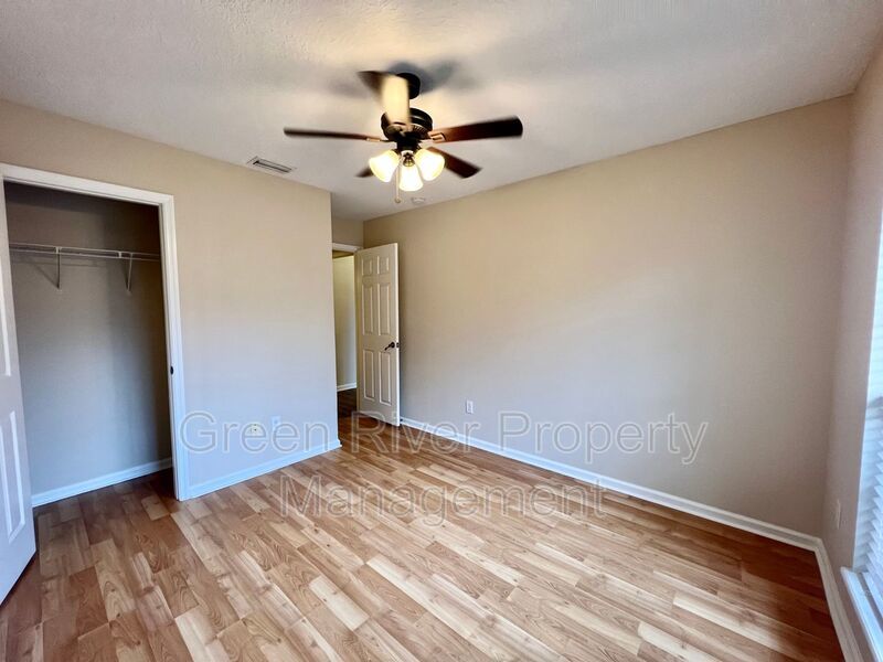 Behind the Gates: A Corner-Lot 4 bedroom, 2 bath Retreat in Coveted Pace Island!! property image