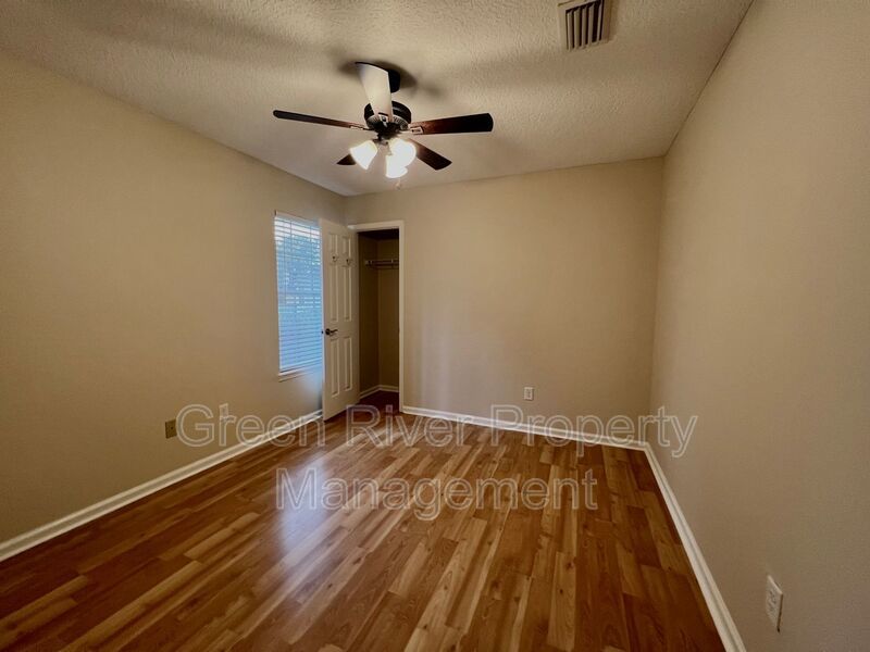 Behind the Gates: A Corner-Lot 4 bedroom, 2 bath Retreat in Coveted Pace Island!! property image