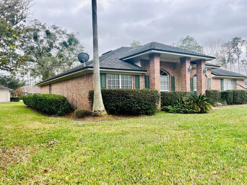 Behind the Gates: A Corner-Lot 4 bedroom, 2 bath Retreat in Coveted Pace Island!! property image