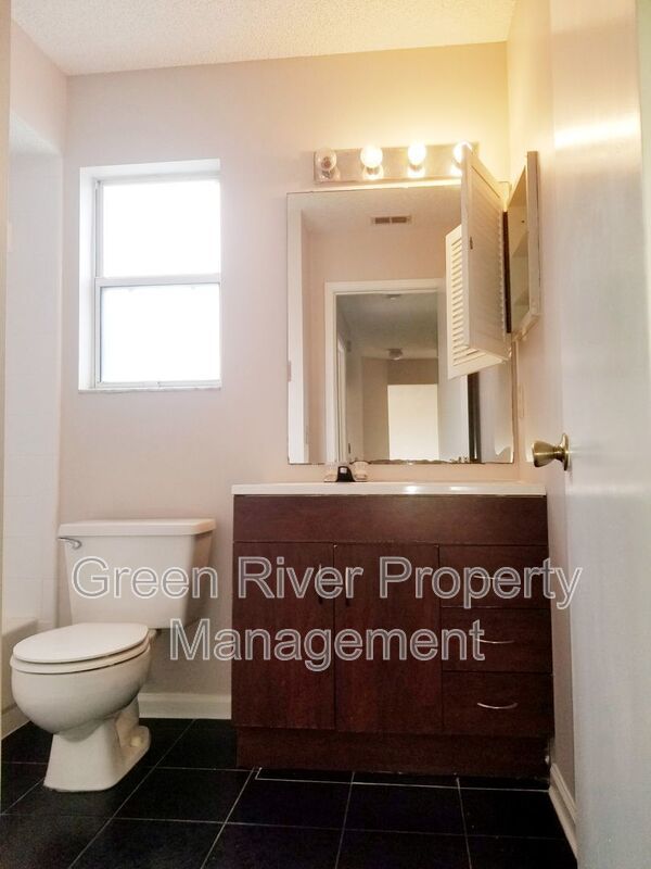 Amazing 3/2.5 in Kensington neighborhood! Minutes from the beaches - Serene Pond Views and Coastal Convenience! property image