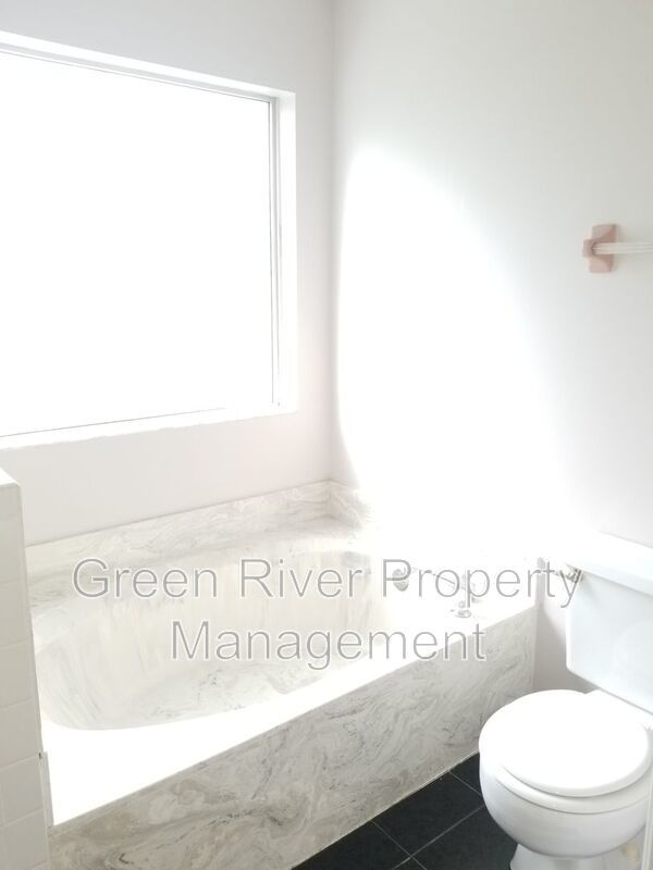 Amazing 3/2.5 in Kensington neighborhood! Minutes from the beaches - Serene Pond Views and Coastal Convenience! property image