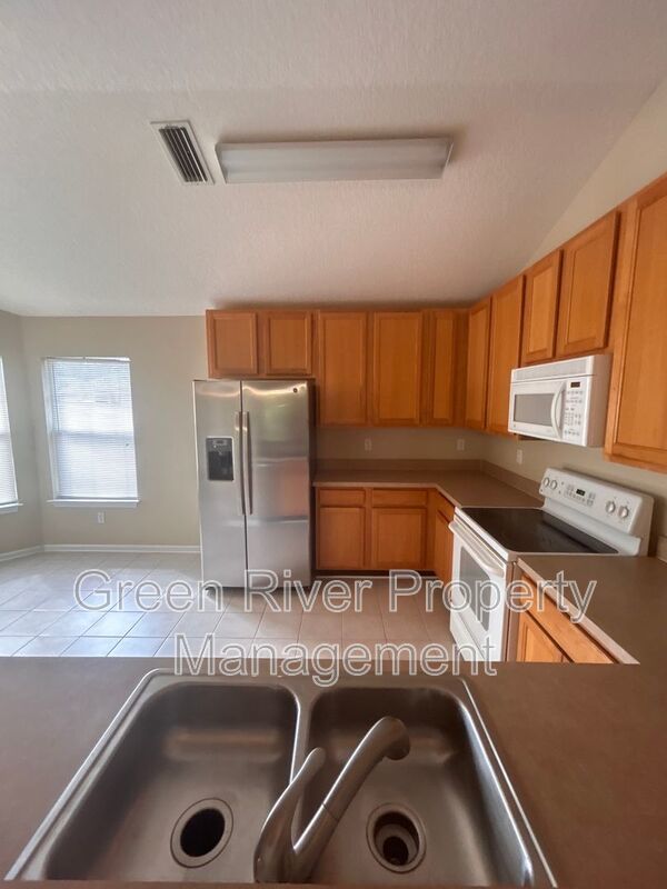 Primary Suite Downstairs + Eagle Harbor Amenities Included! property image