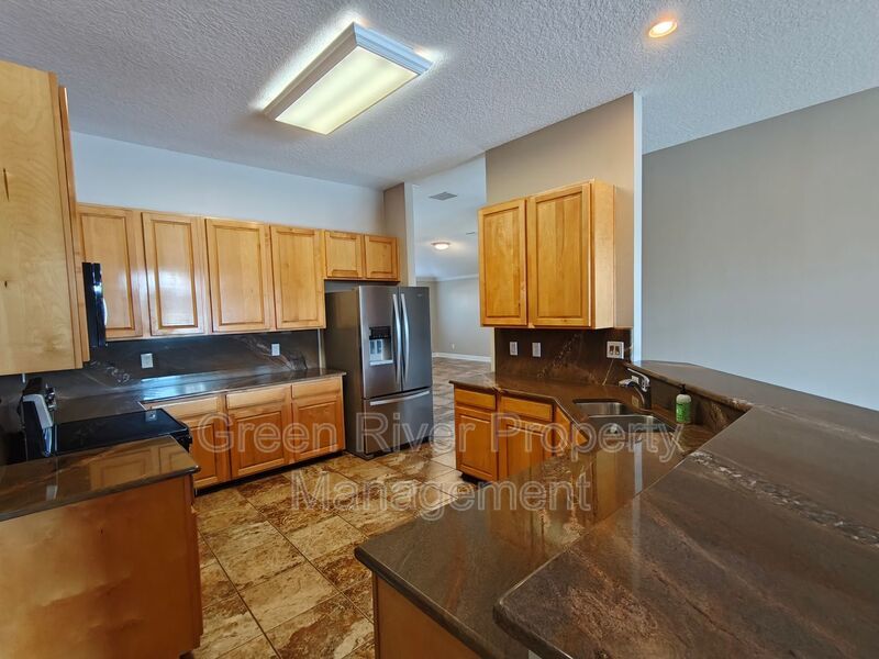 Spacious 5-Bedroom Home with Pond View & Resort-Style Amenities property image