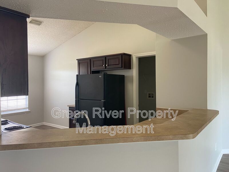 Spacious 4BR Retreat with Open Layout & Huge Fenced Backyard! Priced to Impress! property image