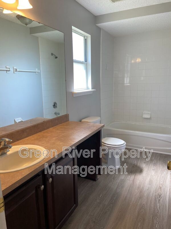 Spacious 4BR Retreat with Open Layout & Huge Fenced Backyard! Priced to Impress! property image