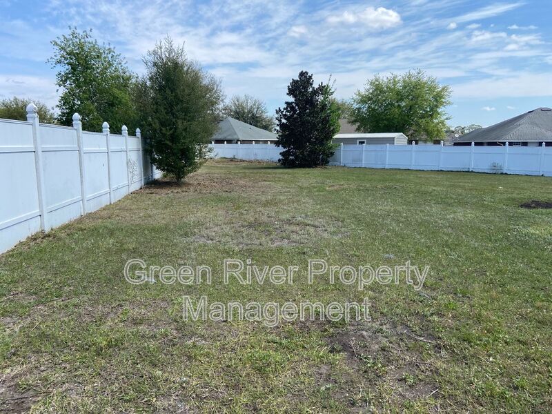 Spacious 4BR Retreat with Open Layout & Huge Fenced Backyard! Priced to Impress! property image