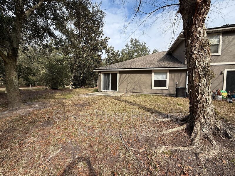 One-Story End Unit Oasis Backing to Preserve - No Carpet + Plantation Amenities!! property image