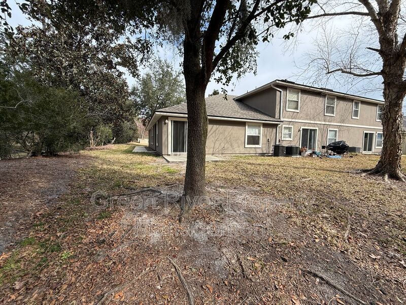 One-Story End Unit Oasis Backing to Preserve - No Carpet + Plantation Amenities!! property image