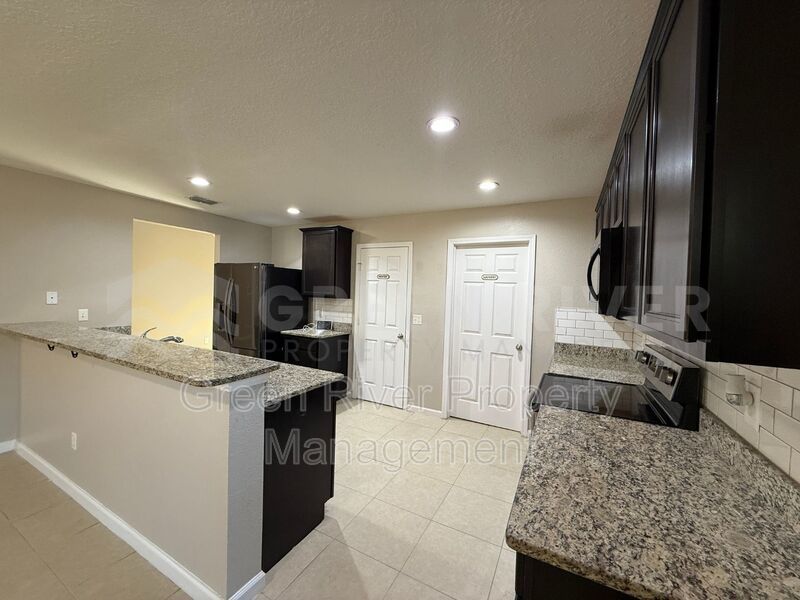 Room to Live, Space to Thrive! Stunning 6BR Home with Solar, Upgrades & Screened Lanai in Macclenny!! property image