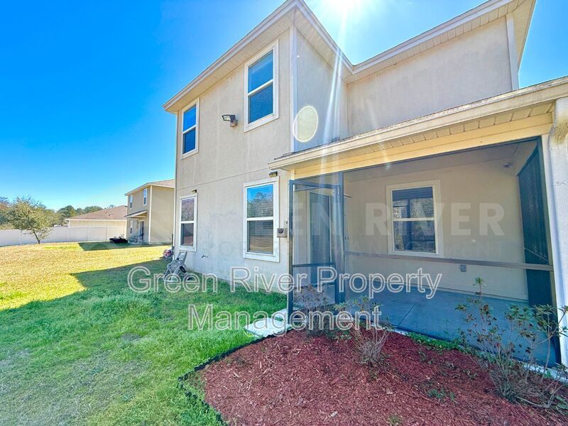 Room to Live, Space to Thrive! Stunning 6BR Home with Solar, Upgrades & Screened Lanai in Macclenny!! property image