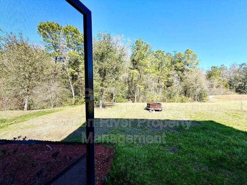 Room to Live, Space to Thrive! Stunning 6BR Home with Solar, Upgrades & Screened Lanai in Macclenny!! property image