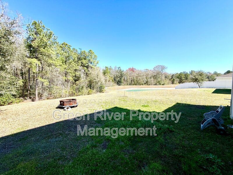 Room to Live, Space to Thrive! Stunning 6BR Home with Solar, Upgrades & Screened Lanai in Macclenny!! property image