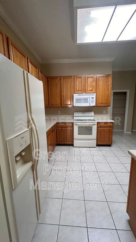 Golf Course Living - 4BR Beauty w/ No Carpet + FIP Amenities Included property image