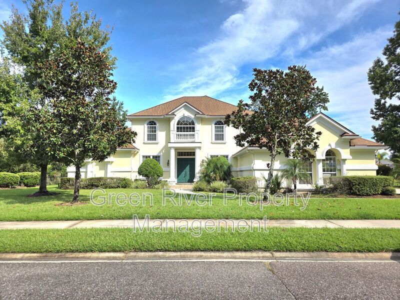 Spacious 5BR/5BA Home with Screened Pool & Pond View in Eagle Harbor at Black Creek! property image