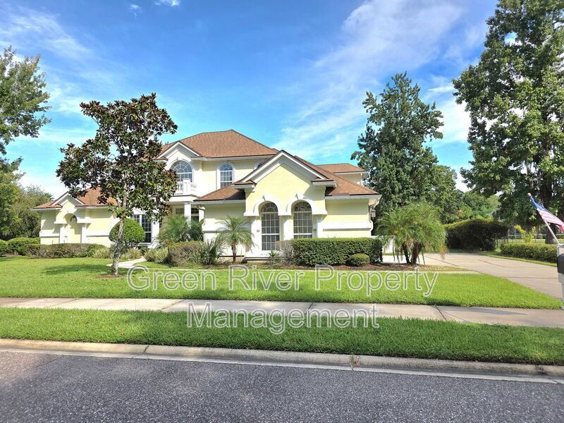 Spacious 5BR/5BA Home with Screened Pool & Pond View in Eagle Harbor at Black Creek! property image