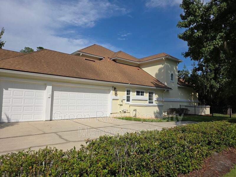 Spacious 5BR/5BA Home with Screened Pool & Pond View in Eagle Harbor at Black Creek! property image