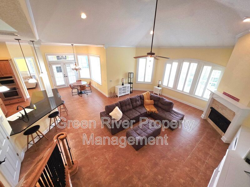Spacious 5BR/5BA Home with Screened Pool & Pond View in Eagle Harbor at Black Creek! property image