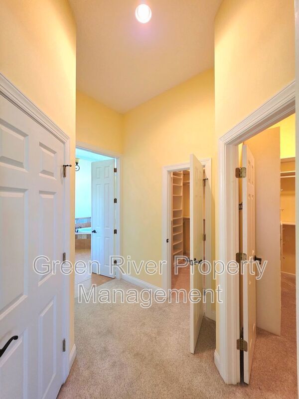 Spacious 5BR/5BA Home with Screened Pool & Pond View in Eagle Harbor at Black Creek! property image