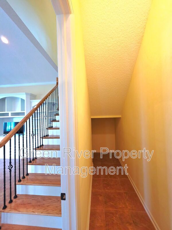Spacious 5BR/5BA Home with Screened Pool & Pond View in Eagle Harbor at Black Creek! property image